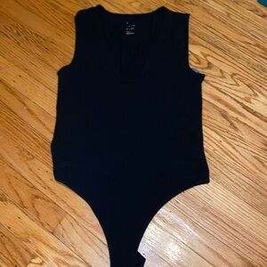 A new day size small black body suit nwt
